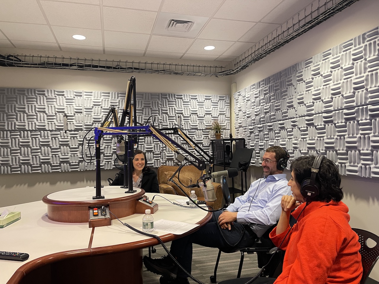 Eliana, Sam, and Rohini sitting in the Yale Broadcast Studio.