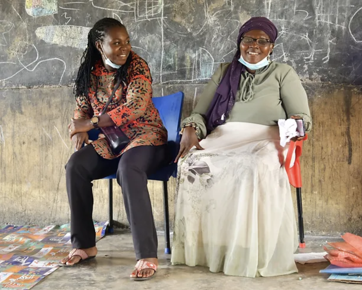 Photo of two women sitting